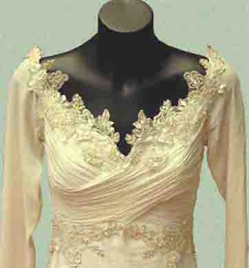 Cream Georgette Cross top lwith ong train. Size 8